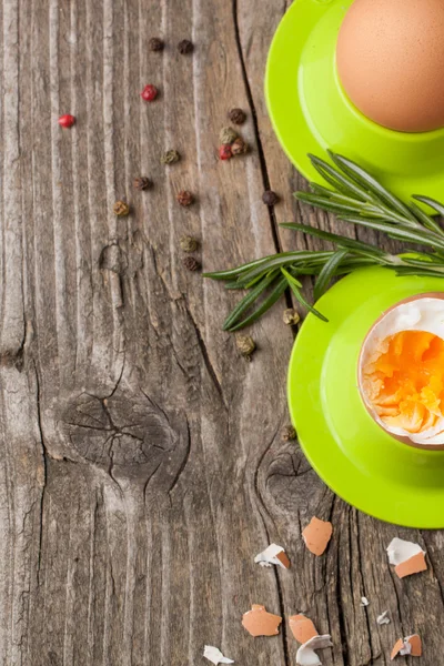 Boiled eggs and rosemary — Stock Photo, Image