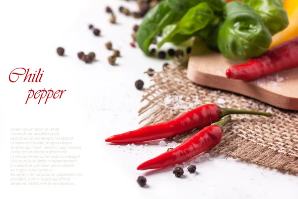 Hot chili peppers s bazalkou — Stock fotografie