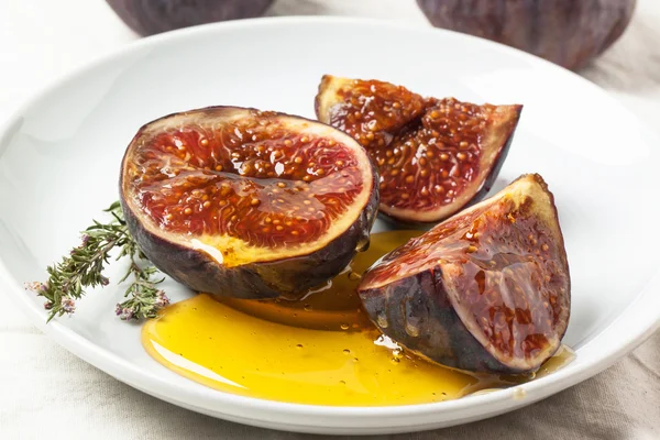 Figs and honey — Stock Photo, Image