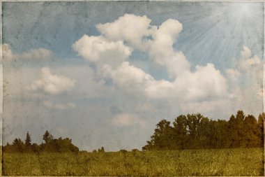 Vintage görüntü alan ve bulutlu gökyüzü