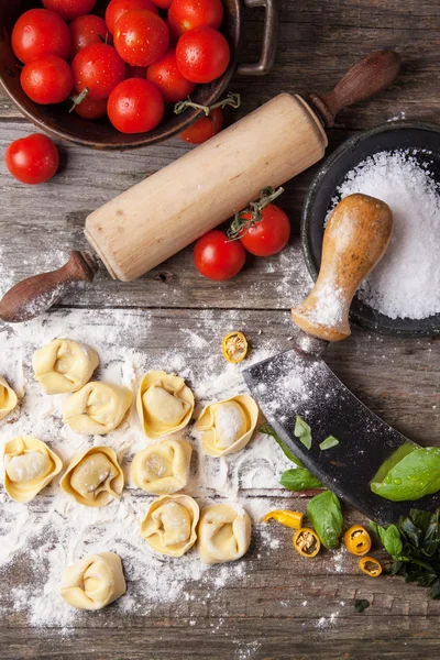 Pasta ravioli on flour — Stock Photo, Image