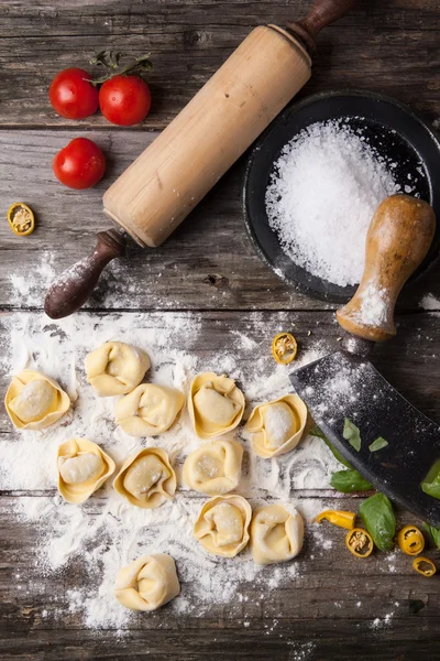 Pasta ravioli on flour — Stock Photo, Image