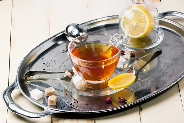 Cup of tea with sugar and lemon — Stock Photo, Image