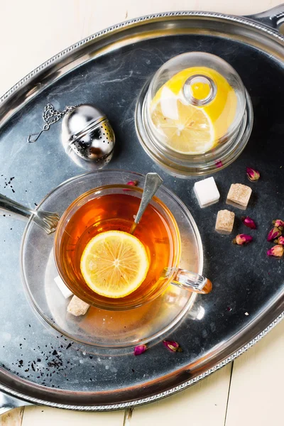 Cup of tea with sugar and lemon — Stock Photo, Image