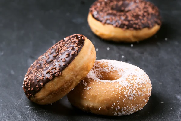 Donuts over dark background — Stock Photo, Image