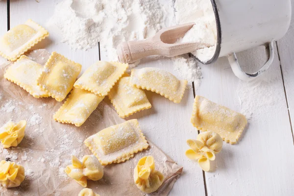 Pasta ravioli on flour — Stock Photo, Image