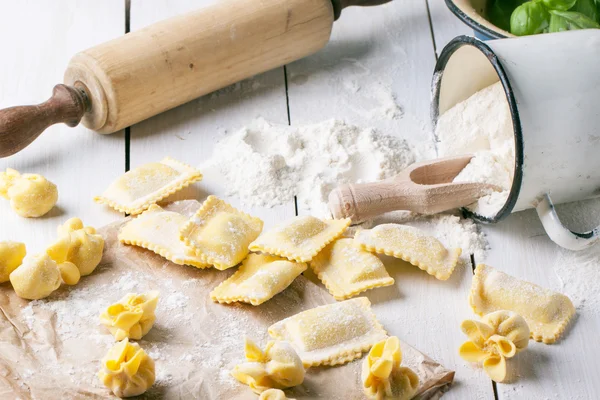 Pasta ravioli on flour — Stock Photo, Image