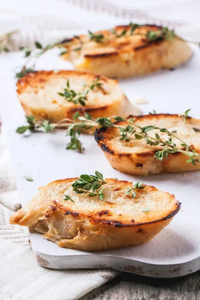 Fried bread croutons with thym — Stock Photo, Image