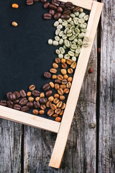 Green, brown and black coffee on chalckboard — Stock Photo, Image