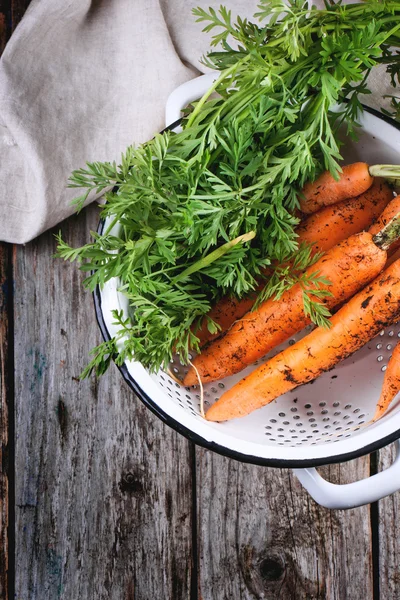 Carrot in colander — Stock Photo, Image