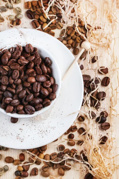 Green, brown and black coffee beans — Stock Photo, Image