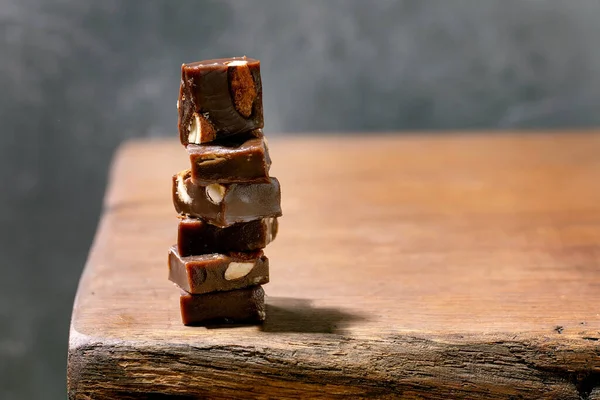 Stack Homemade Toffee Salted Caramel Chocolate Almond Nuts Candy Wooden — Stock fotografie
