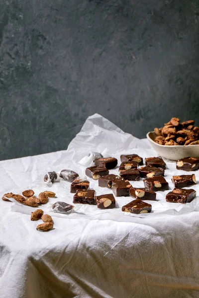 Homemade Toffee Salted Caramel Chocolate Almond Nuts Candy Crumpled Paper — Foto de Stock