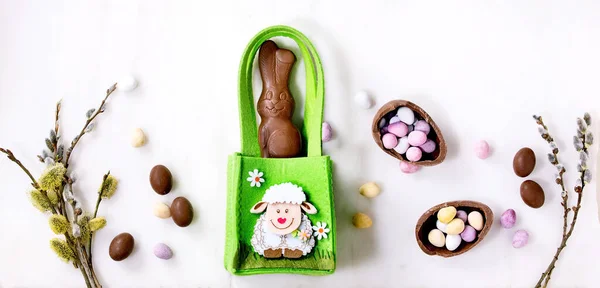 Easter Greeting Card Chocolate Sweets Rabbit Green Bag Candies Eggs — Stock Photo, Image
