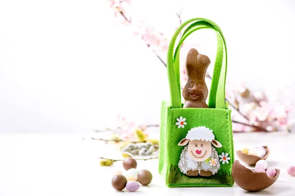 Easter Greeting Card Chocolate Sweets Rabbit Green Bag Candies Eggs — Stock Photo, Image