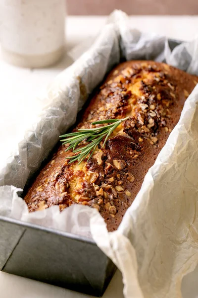 Homemade Lemon Cake Nuts Rosemary Baking Dish White Marble Table — Stock Photo, Image