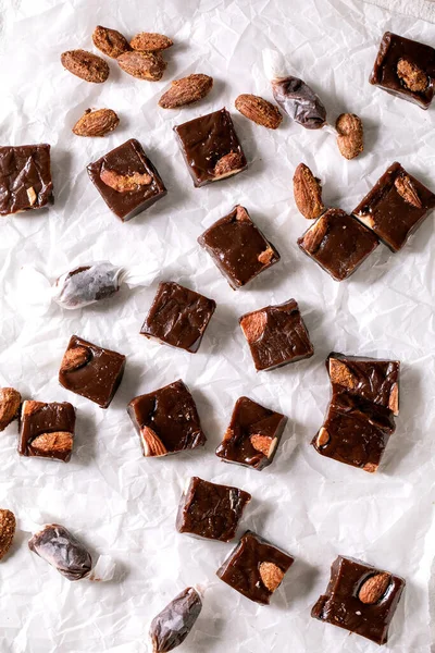 Homemade Toffee Salted Caramel Chocolate Almond Nuts Candy Crumpled Paper — Stock Photo, Image