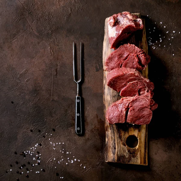 Fresh Sliced Raw Beef Tenderloin Meat Steaks Wooden Board Metal — Stock Photo, Image
