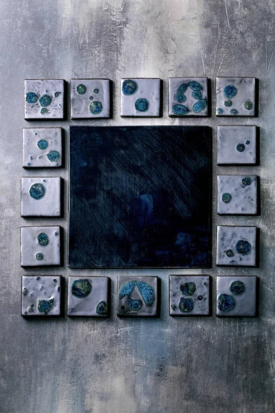 Dark Black Textured Ceramic Tiles Blue Spotted Glaze Different Size 스톡 이미지