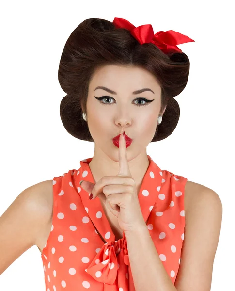 Pin-up style girl with finger on lips — Stock Photo, Image