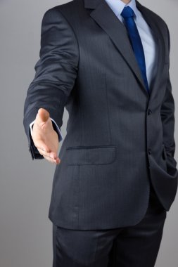 Businessman offering a handshake