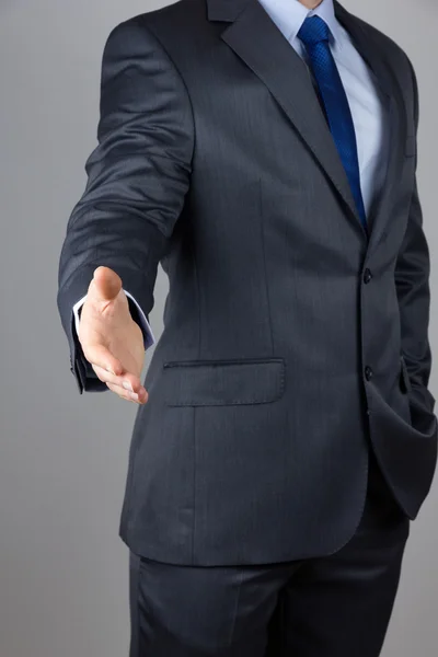 Businessman offering a handshake — Stock Photo, Image