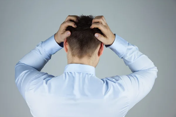 Empresário estressado com dor de cabeça — Fotografia de Stock