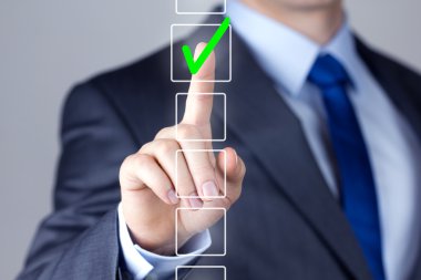 Businessman making right decision touching screen interface clipart