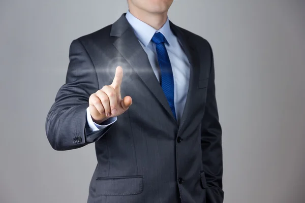 Business man touching an imaginary screen — Stock Photo, Image