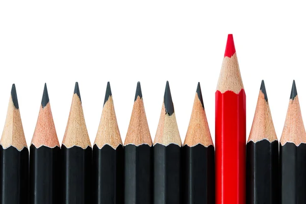 Row of black pencils with one red pencil in middle — Stock Photo, Image