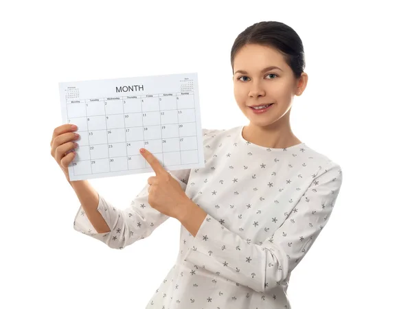 Mladá žena drží měsíční kalendář — Stock fotografie