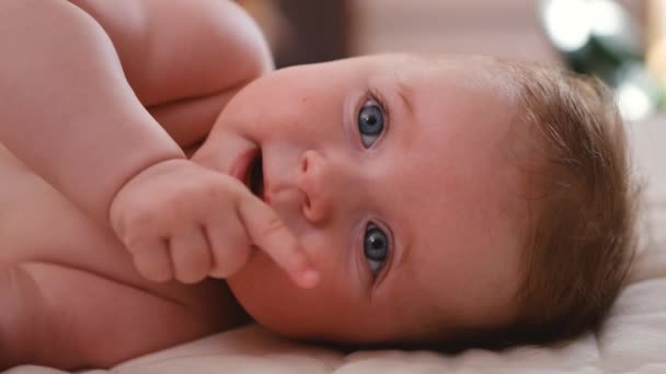 Baby Girl Lies Side Big White Parent Bed Newborn Child — Stockvideo
