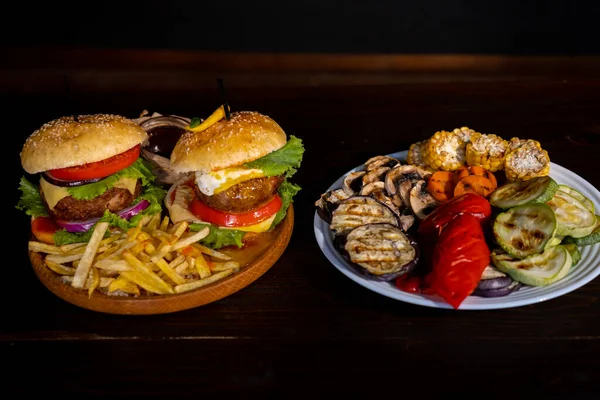 Two Burgers Fries Grilled Vegetables Concept Choosing Healthy Food Fast — Zdjęcie stockowe
