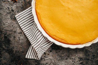 pumpkin tart cake sweet dessert, Homemade pastry for Thanksgiving. Pumpkin cheesecake, top view,