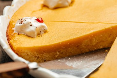 Pumpkin Pie with whipped cream. Homemade pastry for Thanksgiving. Pumpkin cheesecake.
