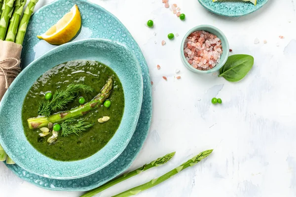 asparagus and spinach and spinach soup. Clean eating, dieting, vegan, vegetarian, healthy food concept. Flat lay. Banner. Top view.