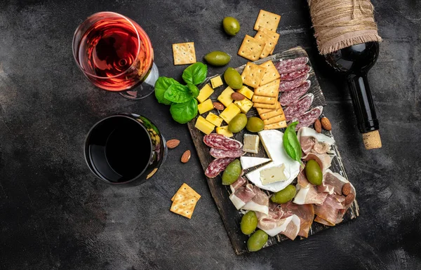 Antipasto Board Sliced Meat Ham Salami Cheese Olives Wine Dark — Stock Photo, Image