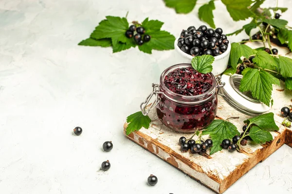 Delicious black currant jam urd, custard or jam and fresh berries, banner, menu, recipe place for text, top view,