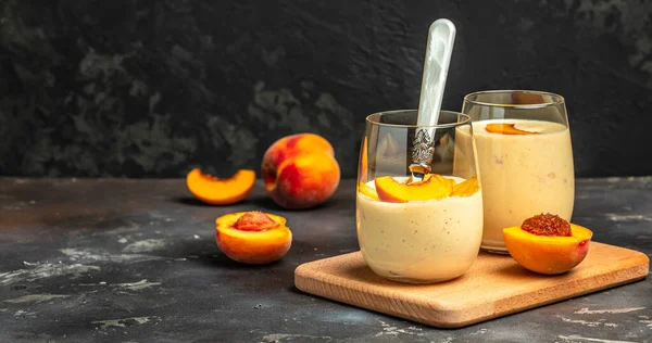Yoghurt with fresh peaches, Delicious breakfast or snack, Clean eating, dieting food concept, Long banner format,