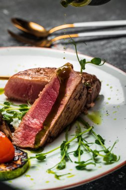 Grilled tuna steak. barbecue fish steak with vegetables. diet vegetarian fish dish, Ketogenic, keto or paleo diet lunch, Top view.