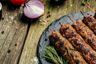 Lula kebab, Grilled Shish kebab on a stick, beef and lamb meat, turkish adana kebab, place for text, top view,