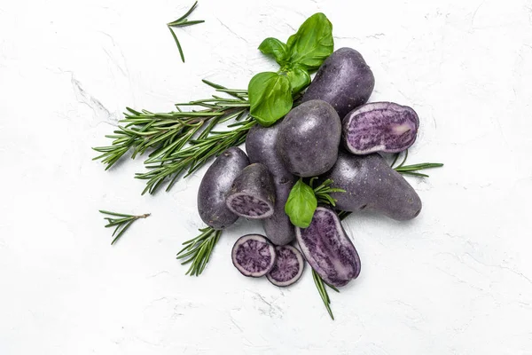 Raw purple sweet potato food on white background. Ipomoea batatas. Batata potato. banner, menu, recipe place for text, top view.