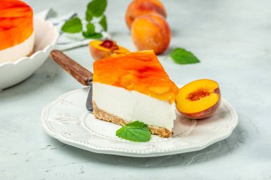 Şeftalili cheesecake. Yemek tarifi geçmişi. Kapat..