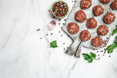 Raw meatballs minced pork on a light background, banner, menu, recipe place for text, top view,