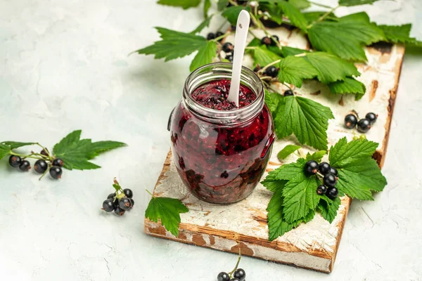 Delicious black currant jam urd, custard or jam and fresh berries, banner, menu, recipe place for text, top view,