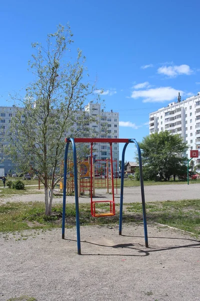 Russia Novosibirsk 2021 Children Swings Courtyard Multi Storey Buildings Empty — Stock Photo, Image