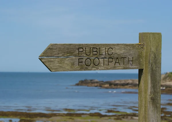 Wooden Sign Post By The Sea — Stock Photo, Image