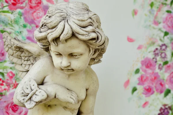 Vintage cupid sculpture — Stock Photo, Image