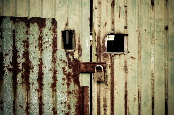 Closed door with master key — Stock Photo, Image