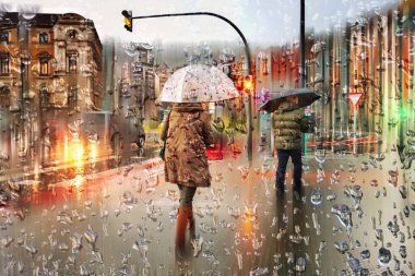 people with an umbrella on the street in rainy days, autumn season 